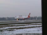 Air Berlin (Belair) A 320-214 HB-IOQ beim Start in Berlin-Tegel am frhen Morgen 08.01.2011