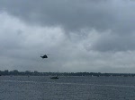 Sea King/148/ein-sea-king-ua-bei-einer Ein Sea King u.a. bei einer Vorf�hrung der Winch �ber der Kieler F�rde beim SAR Meet am 28.06.08 in Kiel-Holtenau.Im Hintergrund ist auch die Windjammerparade der Kieler Woche zu sehen.