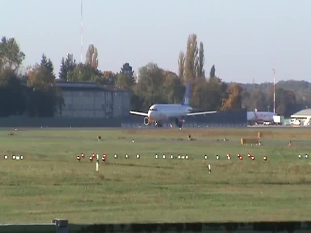 SAS A 319-132 OY-KBP beim Start in Berlin-Tegel am 19.10.2014