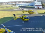 EC 135P-2 D-HOEM startet zum Werkstattflug, dahinter D-HYAE H-145 beim Standlauf, beide ADAC vor der ADAC-Werft in EDKB - 16.01.2020